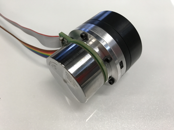 Pictured is a combination showing the maxon brushless DC 70W 24V motor, 2048 counts per turn internally integrated encoder and the new harmonic light weight low profile zero backlash gearhead